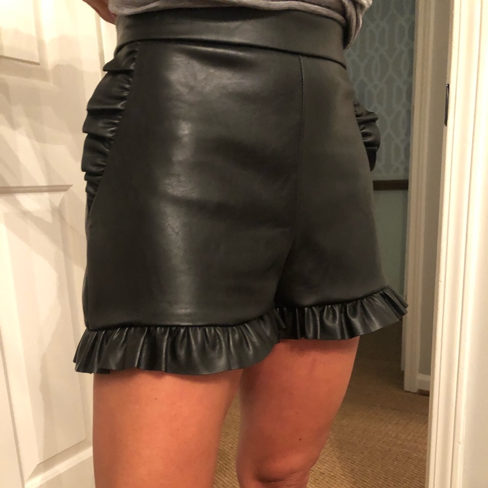 black leather shorts with ruffle detail